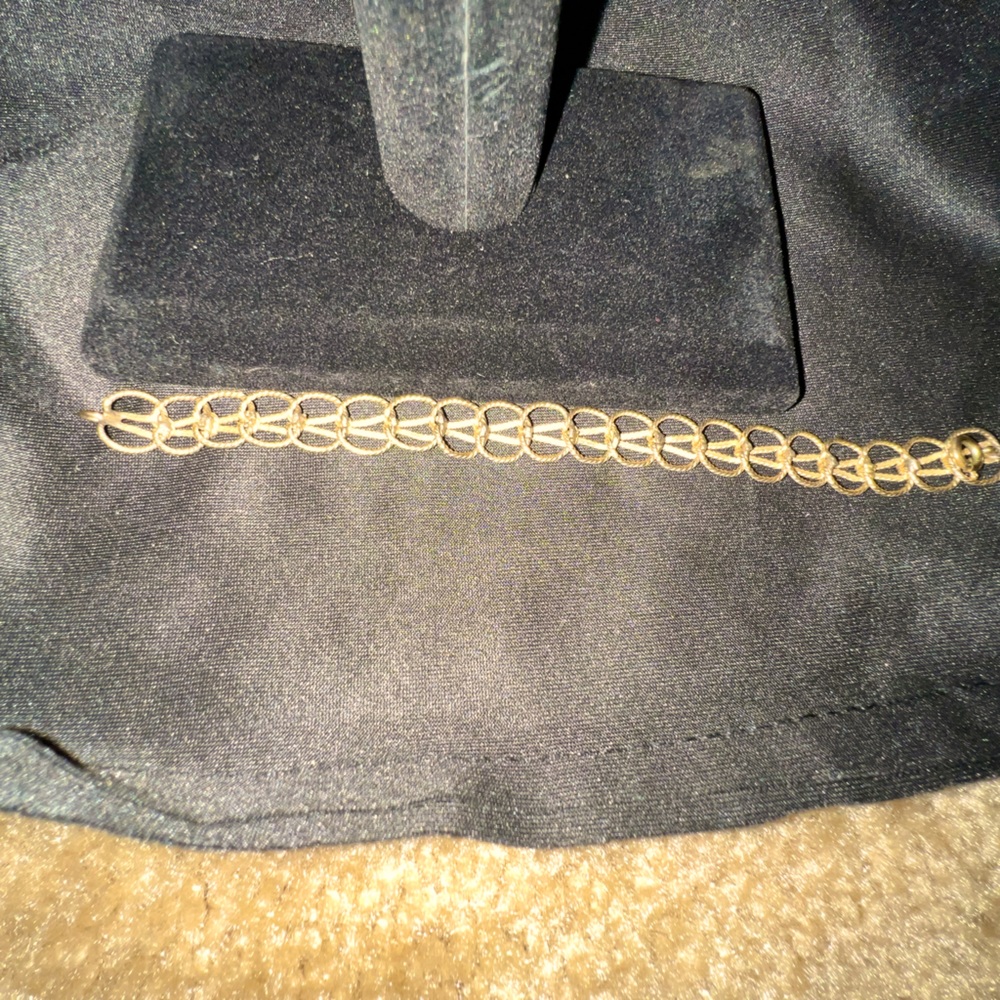 Cute, interesting smaller wrist bracelet gold tone